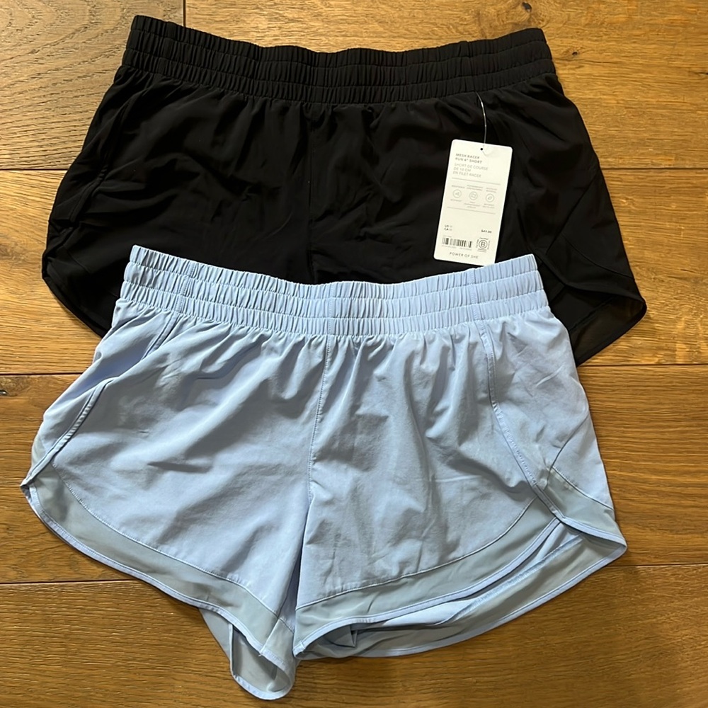 2 pairs Medium Athleta 4” mesh racer run short.  One pair is NWT